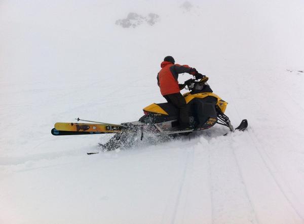 Jason Collins makes the most of the snow on his snowmobile.   